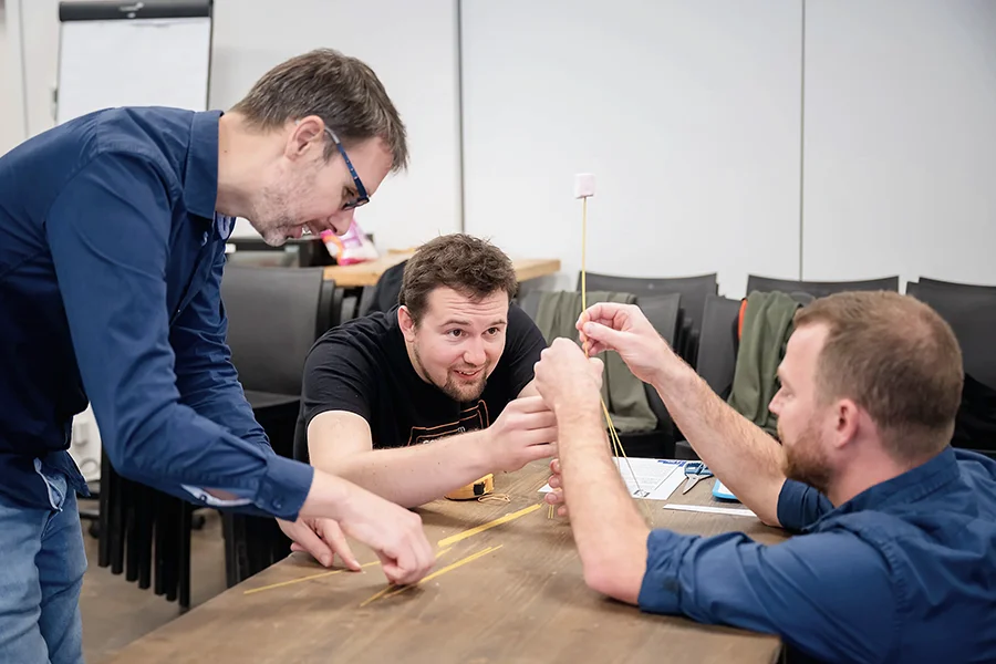 People working together symbolizing collaboration at 5th floor